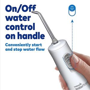 Waterpik water flosser cordless express (NEW IN BOX) batteries included